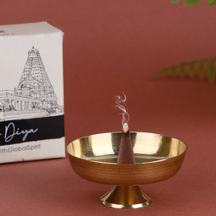 1-inch brass dhoop/candle stand, compact and sturdy design used for holding dhoop cones or candles during pooja and spiritual rituals. 
Indiaβs Largest Pooja Accessories Brand β www.satvikstore.in