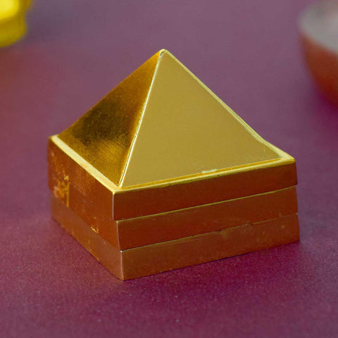 Brass Vastu Pyramid (Vastu Devta Yantra) featuring 45 deity zones, designed to balance energy flow, correct Vastu dosh, and bring prosperity and peace to any space.
Indiaβs Largest Pooja Accessories Brand - www.satvikstore.in