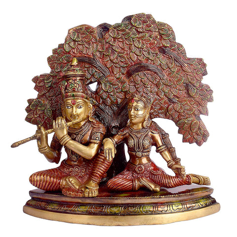11.8 Inch Shree Radha Krishna Sitting Under Tree Brass Statuefeaturing intricate detailing, perfect for spiritual home decor, temple worship, and devotional gifting. Indiaβs Largest Brass Idols Brand - www.satvikstore.in