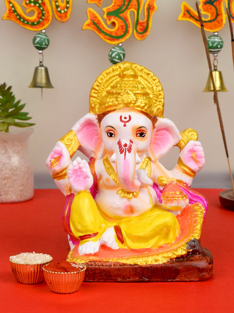6-inch vibrant eco-friendly Ganesha idol in Padmasana pose, made from natural clay and hand-painted with bright, non-toxic colors for home worship. Indiaβs Largest Pooja Accessories Brand β www.satvikstore.in