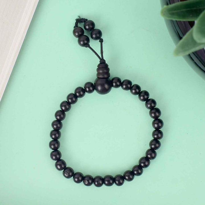6mm Ebony Bracelet with Gloss Finish β sleek and polished black wooden bead bracelet for spiritual balance and style. Indiaβs Largest Pooja Accessories Brand - www.satvikstore.in