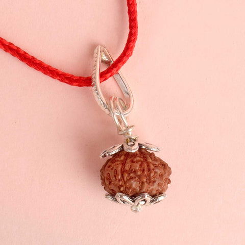 Certified 9 Mukhi Rudraksha Pendant with metal capping for power and protection. Indiaβs Premium Rudraksha Jap Mala Store- www.satvikstore.in