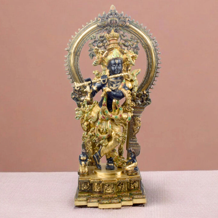Large Brass Idol of 32 Inch Lord Krishna Stands on an Engraved Base with Frame Lord Krishna. Bring divine elegance into your home with this stunning 32-inch Lord Krishna statue. Expertly crafted with intricate details, the statue beautifully portrays Lord Krishna in a serene and graceful stance. The engraved base adds a touch of traditional artistry, while the surrounding frame enhances its majestic presence.