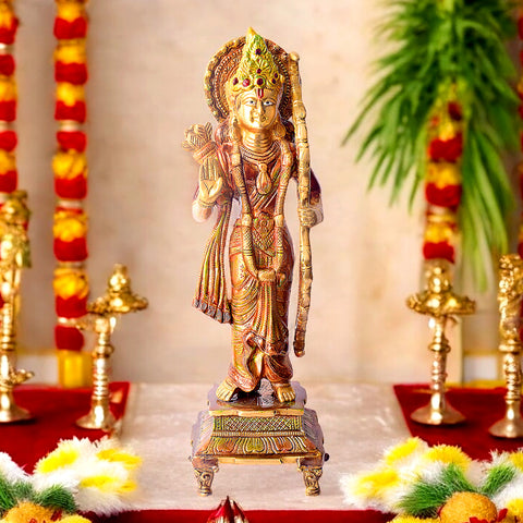 This Opulent Brass Colorful Ram Statue with Bow is a stunning representation of strength, grace, and devotion. Expertly crafted from high-quality brass and adorned with vibrant colors, the statue beautifully depicts Lord Ram in an active pose with his bow, symbolizing courage and righteousness.