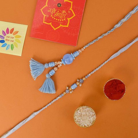 Designer Couple Rakhi Set for Bhaiya and Bhabhi with Roli Chawal and Ram Sita Stickers β Raksha Bandhan Gift Combo. Indiaβs Largest Brass Idols Brand - www.satvikstore.in