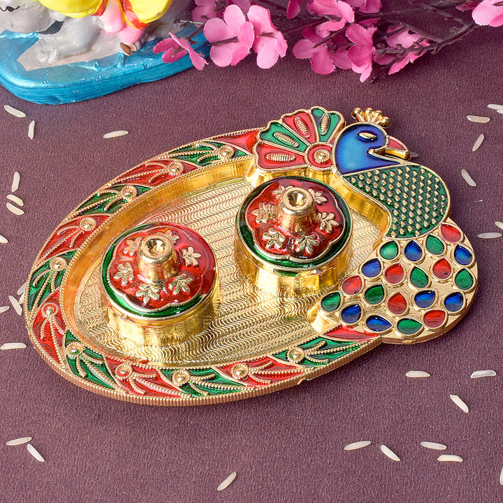 Artistic peacock-themed kumkum holder crafted with intricate detailing, perfect for traditional rituals and festive decor. Indiaβs Largest Pooja Accessories Brand β www.satvikstore.in