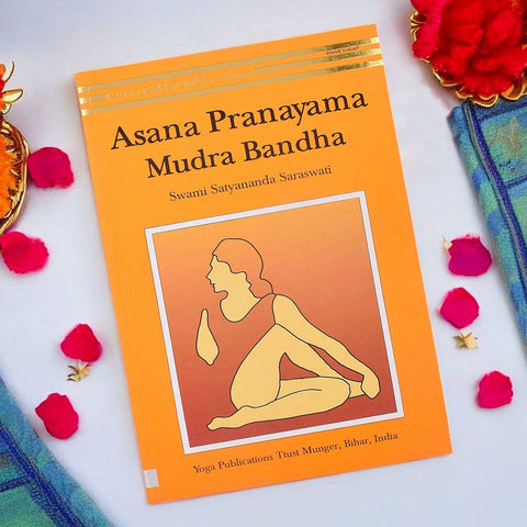 Front cover of the "Asana Pranayama Mudra Bandha β Golden Jubilee Edition" paperback, a comprehensive guide to yogic practices by Bihar School of Yoga. Indiaβs Largest Pooja Accessories Brand β www.satvikstore.in