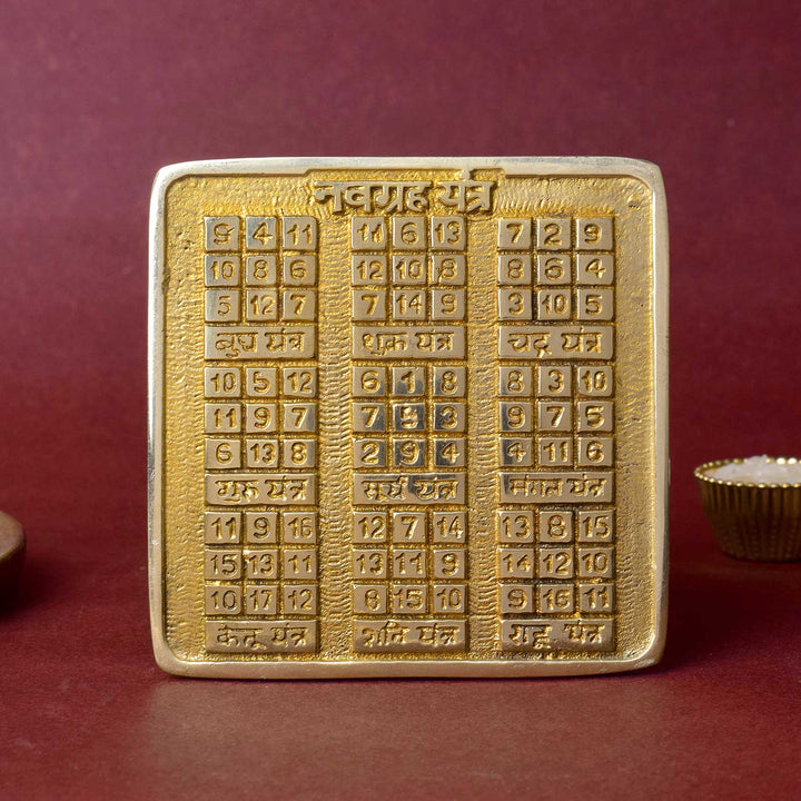 Asht Dhatu Navgrah Yantra with sacred engravings of nine planetary symbols, designed for balancing astrological energies and removing graha doshas in home or office. India’s Largest Pooja Accessories Brand - www.satvikstore.in