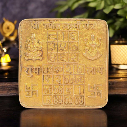 Asht Dhatu Shree Ganesh Laxmi Yantra intricately engraved with symbols of prosperity and obstacle removalβideal for wealth attraction, business success, and spiritual balance. Indiaβs Largest Pooja Accessories Brand - www.satvikstore.in