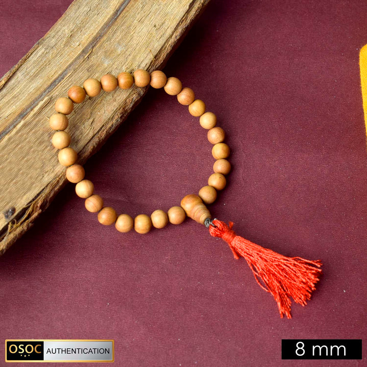 Beautiful handcrafted 8mm 27 Bead White Chandan Money Mala made from pure sandalwood beads for attracting wealth, prosperity, and spiritual calmness.
India’s Premium Jap Mala Store - www.satvikstore.in