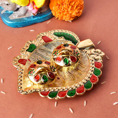 Beautifully crafted leaf-shaped kumkum holder designed for rituals and traditional pooja ceremonies, showcasing elegant detailing and spiritual charm. Indiaβs Largest Pooja Accessories Brand β www.satvikstore.in
