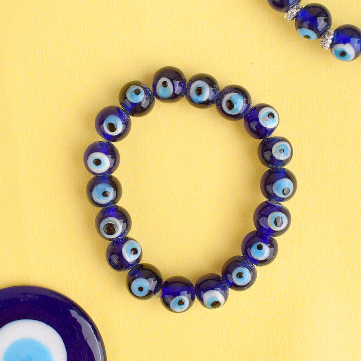 Blue Evil Eye Bracelet for Girls and Women with an enchanting blue evil eye charm, offering stylish protection against negativity. Indiaβs Largest Pooja Accessories Brand β www.satvikstore.in