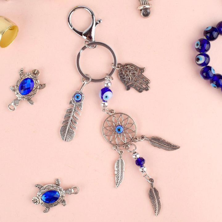 Blue Evil Eye Hamsa Leaf Dream Catcher Keychain β A spiritual and protective charm with the power of the Evil Eye and Hamsa hand. Indiaβs Largest Pooja Accessories Brand β www.satvikstore.in
