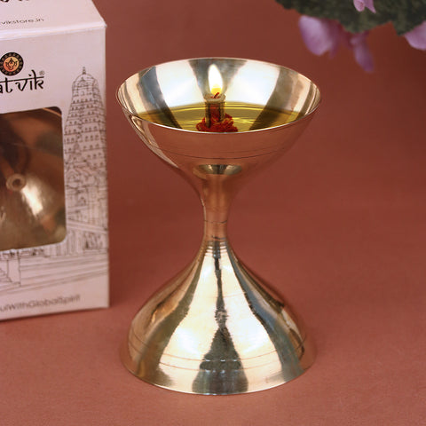 Brass Akhand Pooja Diya β Traditional unbroken flame diya for continuous spiritual lighting during rituals. Indiaβs Largest Pooja Accessories Brand β www.satvikstore.in