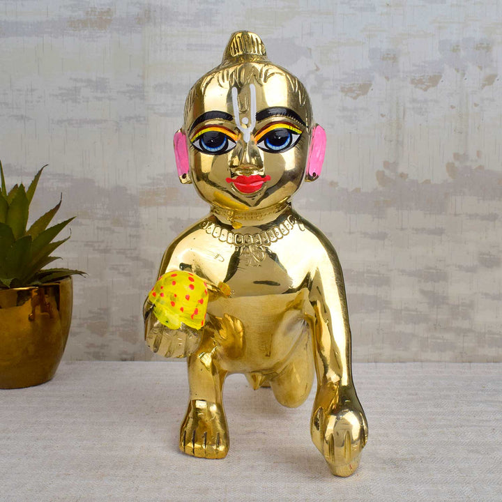Brass Bal Gopal Idol (Size 10) depicting Laddu Gopal in a playful pose for home temple worship. Indiaās Largest Pooja Accessories Brand - www.satvikstore.in