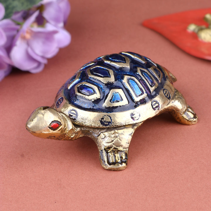 Brass Colored Turtle Small (Blue) – A symbol of stability and good fortune, perfect for creating a peaceful and prosperous atmosphere. India’s Largest Pooja Accessories Brand – www.satvikstore.in