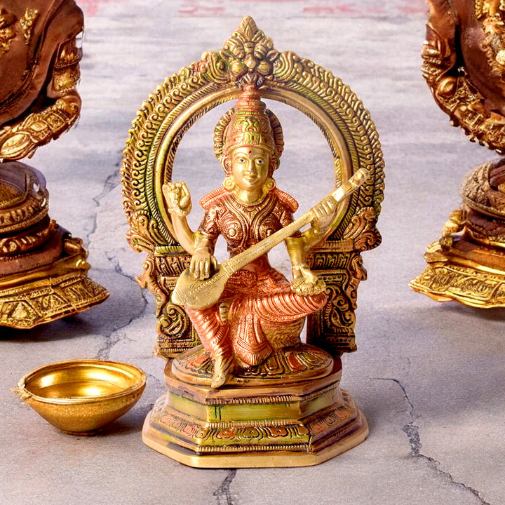 9.2 Inch Brass Goddess Saraswati Statue depicting the deity seated gracefully with veena, symbolizing wisdom, knowledge, and arts, ideal for home temple or study décor. No.1 Brass Idol Store www.satvikstore.in
