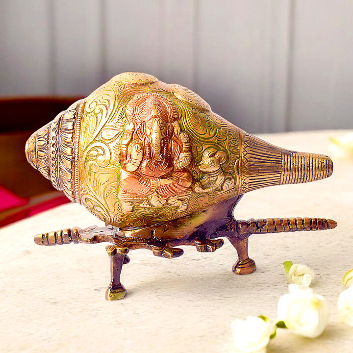 5.9-inch Handcrafted Indian Brass Shankh with Lord Ganesha engraving and elegant brass stand β perfect for spiritual dΓ©cor and temple rituals. No.1 Brass Idol Store www.satvikstore.in