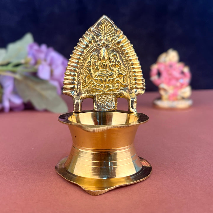 Brass Kamakshi Amman Diya (Small) β Traditional South Indian oil lamp featuring the divine form of Goddess Kamakshi, made in pure brass for auspicious rituals. Indiaβs Largest Pooja Accessories Brand β www.satvikstore.in