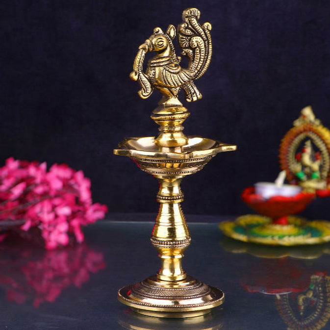 A beautifully crafted Brass Panchmukhi Diya (Oil Lamp), featuring five intricate faces symbolizing the five elements. This traditional diya is perfect for religious ceremonies, spiritual rituals, or as an elegant decorative piece, bringing peace and light to any space. Indiaβs Largest Pooja Accessories Brand β www.satvikstore.in