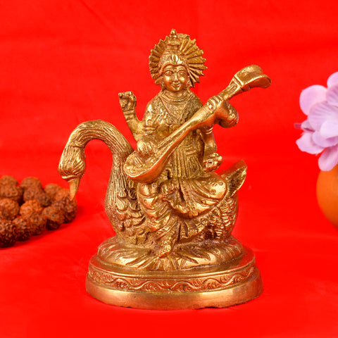 4.7 Inch Divine Brass Saraswati Maa Idol beautifully crafted, depicting the Goddess of knowledge and wisdom seated gracefully with a veena, ideal for home temple and spiritual dΓ©cor. No.1 Brass Idol Store www.satvikstore.in