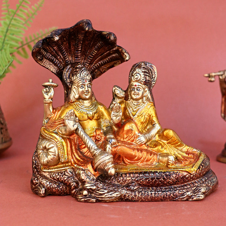 6.4 Inch Brass Colorful Vishnu Laxmi Idol – Exquisitely handcrafted and vibrantly painted statue of Lord Vishnu and Goddess Lakshmi, symbolizing wealth, protection, and divine harmony, ideal for home temples and festive decor. No.1 Brass Idol Store www.satvikstore.in