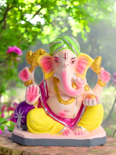 Colorful 6 Inch eco-friendly Ganesha idol seated in Padmasana pose, ideal for Ganesh Chaturthi puja and home decor. Indiaβs Largest Pooja Accessories Brand β www.satvikstore.in