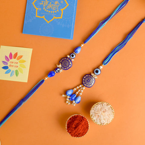 Designer Couple Rakhi Set for Bhaiya and Bhabhi with Roli Chawal and Ram Sita Stickers β Raksha Bandhan Gift Combo. Indiaβs Largest Brass Idols Brand - www.satvikstore.in