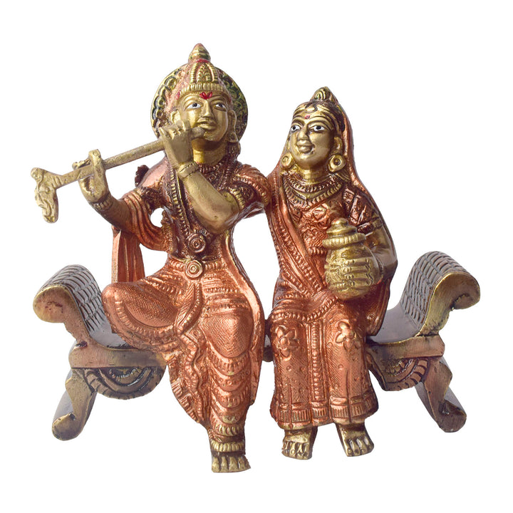 The 4.7 Inch Graceful Sitting Radha Krishna on Bench β A Spiritual Masterpiece is a beautifully crafted idol that captures the essence of divine love and serenity. This exquisite piece features Radha and Krishna seated gracefully on a bench, symbolizing their eternal bond and peaceful companionship. Krishna, with his flute, and Radha, with a serene expression, reflect the harmonious union of the divine couple.