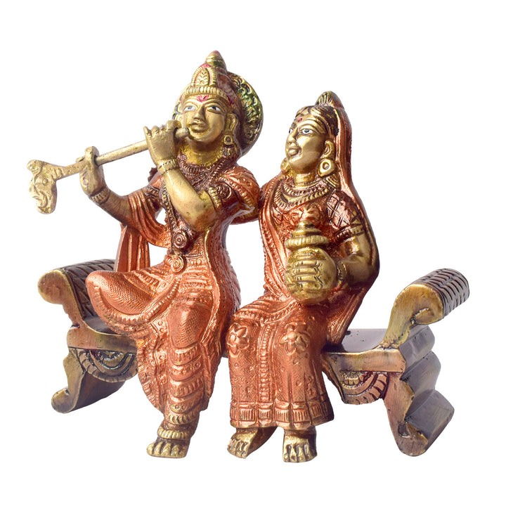 The 4.7 Inch Graceful Sitting Radha Krishna on Bench β A Spiritual Masterpiece is a beautifully crafted idol that captures the essence of divine love and serenity. This exquisite piece features Radha and Krishna seated gracefully on a bench, symbolizing their eternal bond and peaceful companionship. Krishna, with his flute, and Radha, with a serene expression, reflect the harmonious union of the divine couple.