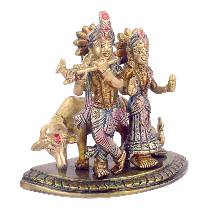 The 5.5 Inch Divine Radha Krishna with Kamdhenu Cow Idol is a captivating symbol of eternal love, harmony, and divine blessings. This beautifully crafted idol features Radha and Krishna in a serene pose, with Krishna playing his mesmerizing flute and Radha standing gracefully by his side.
