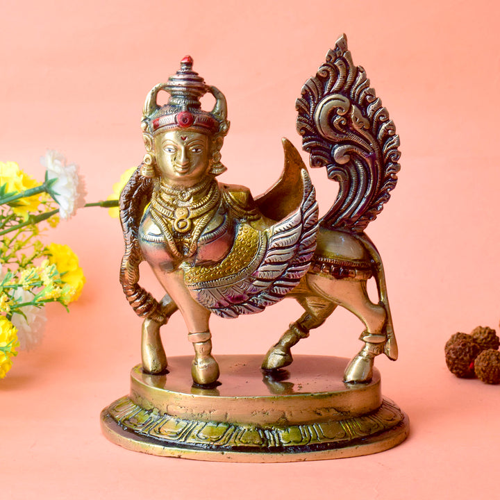 The "6.5 Inch Brass Kamdhenu Cow Statue" is a beautifully crafted representation of Kamdhenu, the sacred wish-fulfilling cow in Hindu mythology. Standing at 6.5 inches tall, this intricately designed statue is made from high-quality brass, showcasing exquisite detailing that highlights Kamdhenu's divine form, with a peaceful and nurturing presence.