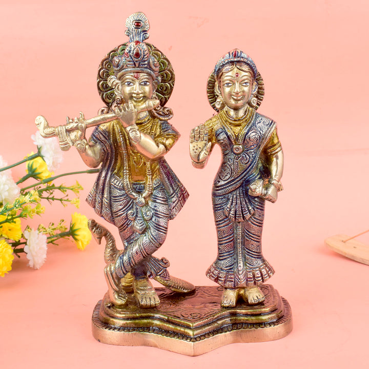 The 8 Inch Radha Krishna Idol β A Symbol of True Devotion and Love is a magnificent representation of the eternal bond between Radha and Krishna, capturing the purity and depth of their divine love. This beautifully crafted idol depicts Krishna playing his flute, while Radha stands beside him, radiating grace, love, and devotion.