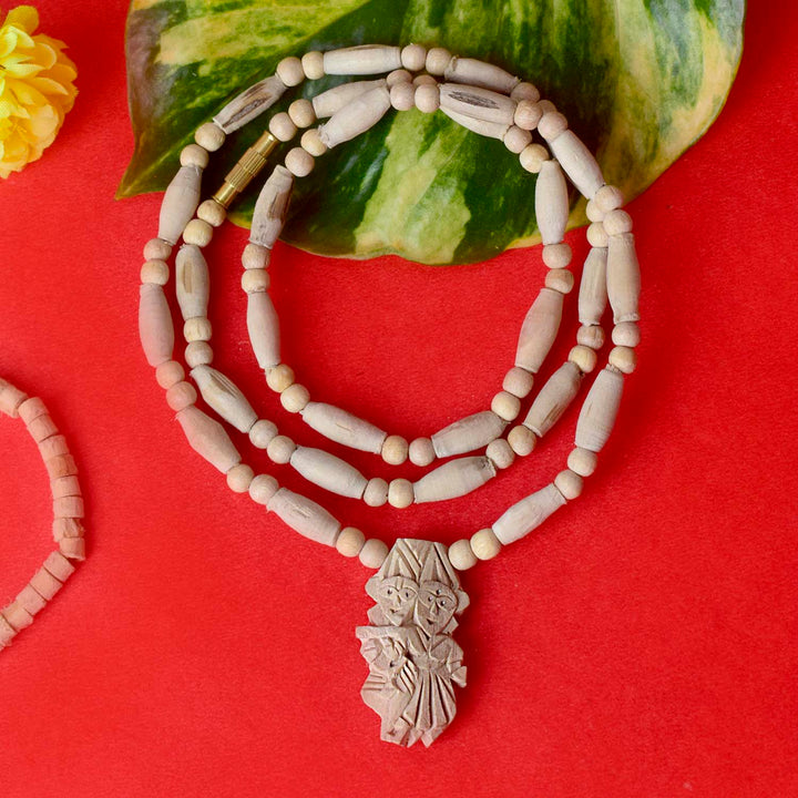 100% Original Tulsi Mala with sacred Tulsi beads and a Radha Krishna locket, ideal for devotional wear and spiritual connection. India’s Premium Jap Mala Store- www.satvikstore.in