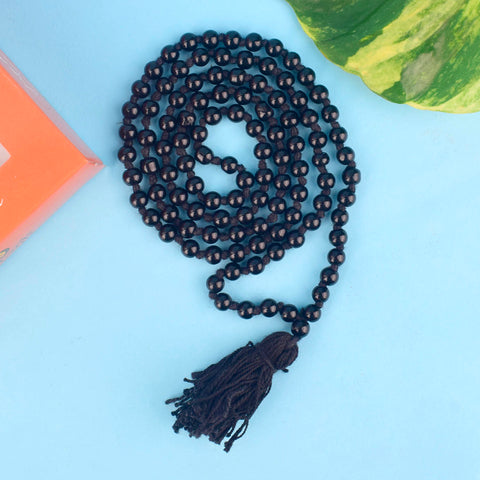 Shani Mala made with black beads, traditionally used for chanting Shani mantras and worshipping Shani Dev.  Indiaβs Premium Jap Mala Store- www.satvikstore.in
