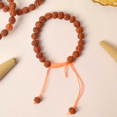 Handcrafted dark brown Rudraksha bracelet made with sacred beads for spiritual balance and meditation. Indiaβs Premium Rudraksha Jap Mala Store- www.satvikstore.in