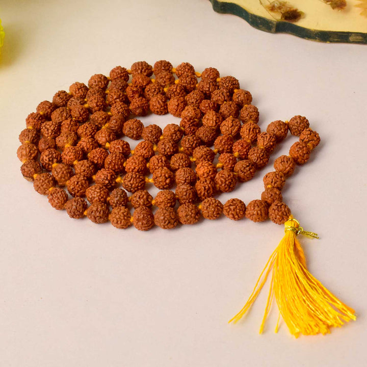 Certified Rudraksha mala made from brown Elaeocarpus ganitrus beads, ideal for spiritual practices and meditation. India’s Premium Rudraksha Jap Mala Store- www.satvikstore.in