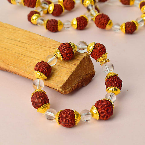 Natural dark brown Rudraksha bracelet with spiritual and healing properties, designed for daily wear and meditation.  Indiaβs Premium Rudraksha Jap Mala Store- www.satvikstore.in