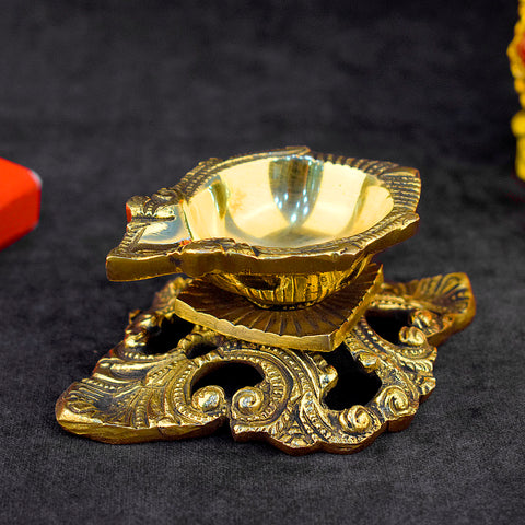 Designer Brass Diya β A beautifully crafted and ornate oil lamp made from high-quality brass, perfect for spiritual rituals, poojas, and as a decorative piece for your home or temple.  Indiaβs Largest Pooja Accessories Brand β www.satvikstore.in