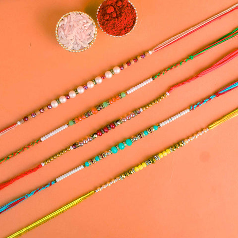 Set of 5 Designer Rakhi Threads with Roli Chawal and Ram Sita Stickers for Raksha Bandhan Celebration. Indiaβs Largest Pooja Accessories Brand - www.satvikstore.in