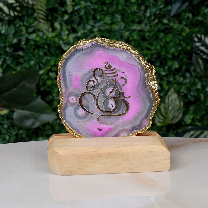 Divine Ganesha Agate Stone Stand featuring a beautifully hand-painted image of Lord Ganesha on a polished agate slice, elegantly displayed on a metal stand for spiritual home decor. Indiaβs Largest Pooja Accessories Brand β www.satvikstore.in