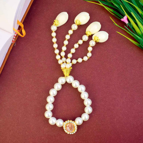 Elegant white pearl Guruji Swaroop Bracelet with handcrafted latkan, ideal for festive occasions, gifting, and spiritual connection. Indiaβs Largest Pooja Accessories Brand β www.satvikstore.in