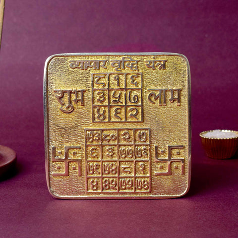Energized Asht Dhatu Vyapar Yantra for business success, engraved with divine symbols to attract financial prosperity, growth, and protection in commercial ventures. Indiaβs Largest Pooja Accessories Brand - www.satvikstore.in