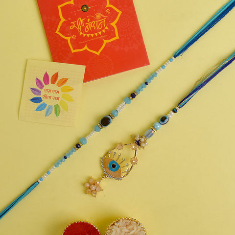 Designer Couple Rakhi Set for Bhaiya and Bhabhi with Roli Chawal and Ram Sita Stickers β Raksha Bandhan Gift Combo. Indiaβs Largest Brass Idols Brand - www.satvikstore.in