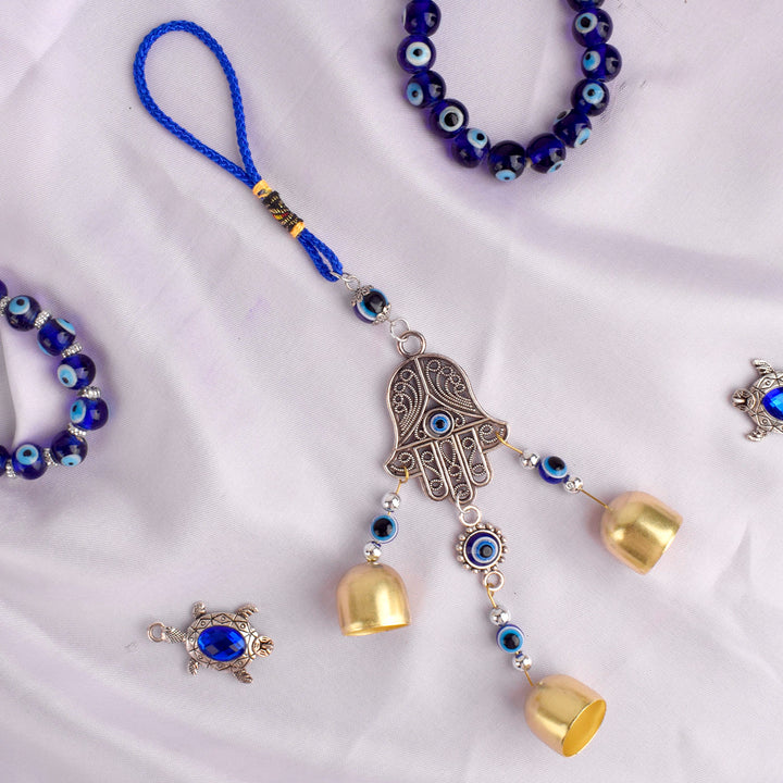 Evil Eye Hamsa Hand Wall Hanging with Bells – A handmade spiritual decor piece for protection and positive energy. India’s Largest Pooja Accessories Brand – www.satvikstore.in