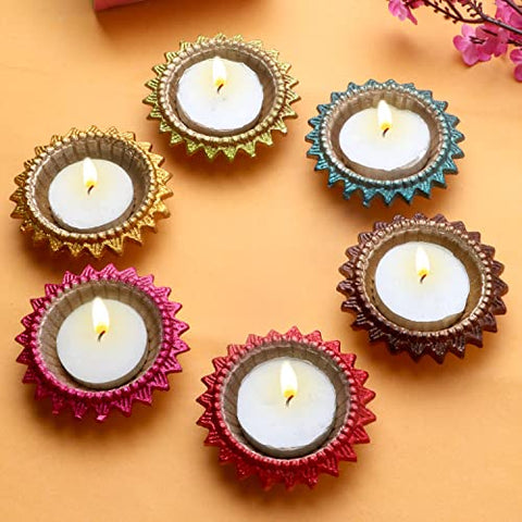Exquisite Decorative Multicolor Surya Metal Diya β A beautifully crafted metal diya with intricate multicolor designs representing the Sun (Surya). Indiaβs Largest Pooja Accessories Brand β www.satvikstore.in