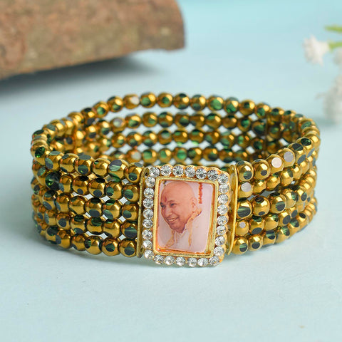 Five Layered Green & Golden Beads Guruji Swaroop Bracelet featuring vibrant layered beads and Jai Guruji Swaroop β perfect for spiritual wear, festive gifting, and daily devotion. Indiaβs Largest Pooja Accessories Brand β www.satvikstore.in