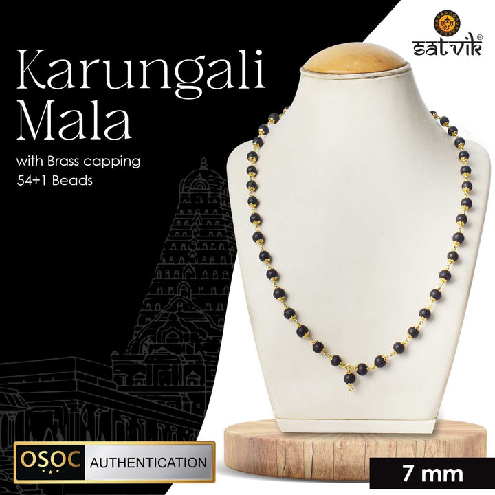 Government-certified Karungali/Ebony mala featuring a golden brass cap, used for meditation, prayer, and spiritual practices.India’s Premium Jap Mala Store - www.satvikstore.in Govt Lab Certified 100% Original Karungali Wood mala online. Black Ebony wood karungali Malai online | satvikstore.in. Best selling and No 1 Karungali mala