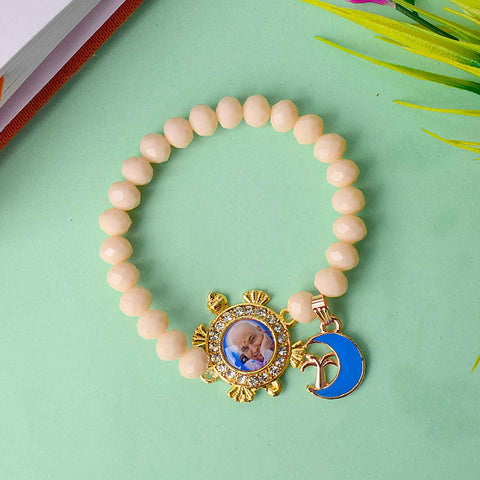 Guruji Swaroop Bracelet featuring colourful assorted beads with charms β handmade spiritual accessory perfect for pooja, gifting, and daily devotion. Satvikstore.in