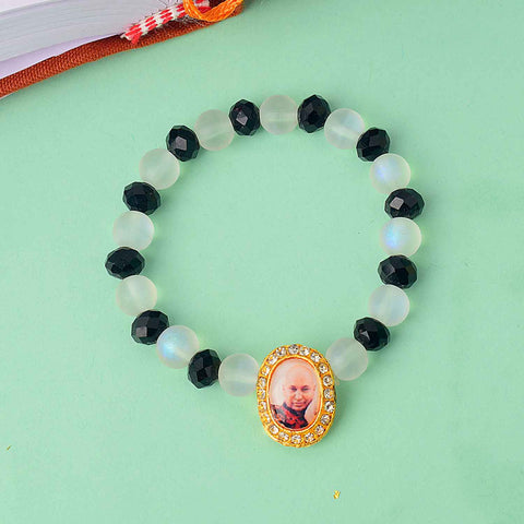 Guruji Swaroop Bracelet with elegant white and black beads β spiritual bracelet for pooja, gifting, satsangs, and daily wear. Satvikstore.in